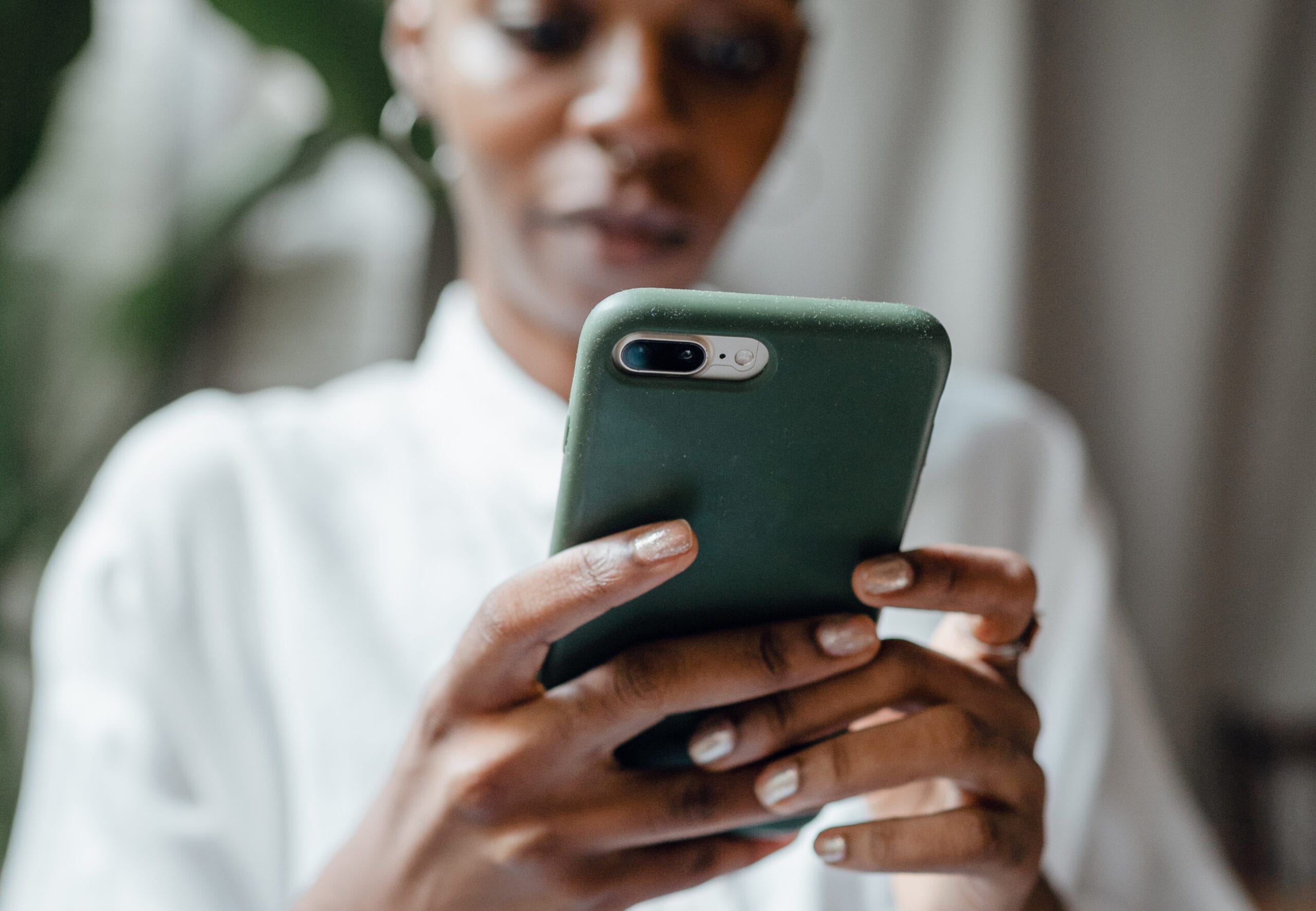 woman holding mobile phone